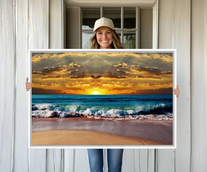 The Ocean Sunrise Over Golden Beach Waves wall art is prominently displayed, capturing the serene beauty of a beach at sunrise.