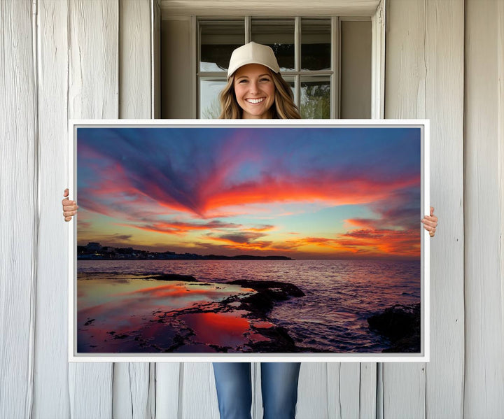 The Glorious Sunset on The Beach canvas print adorns the dining room.