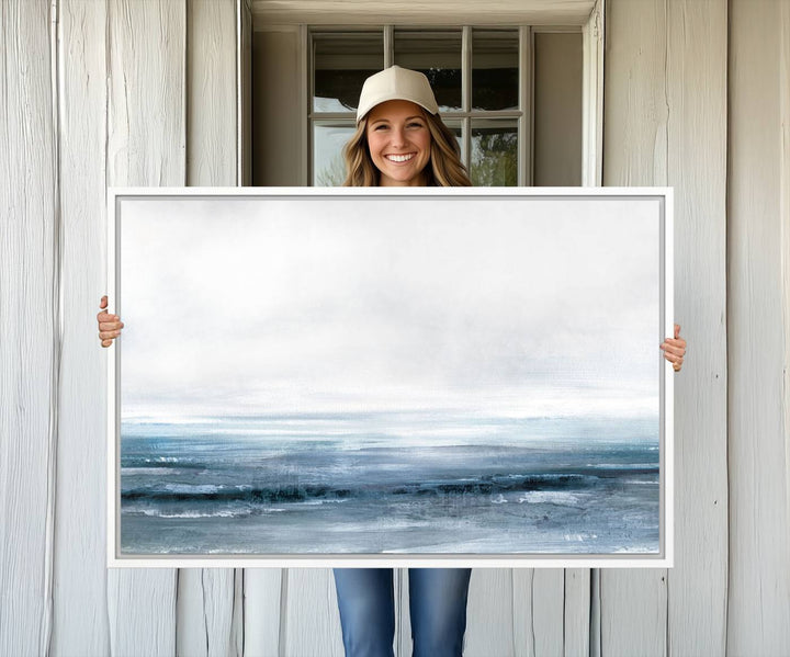 The dining area features Blue Ocean Abstract Artwork on canvas.