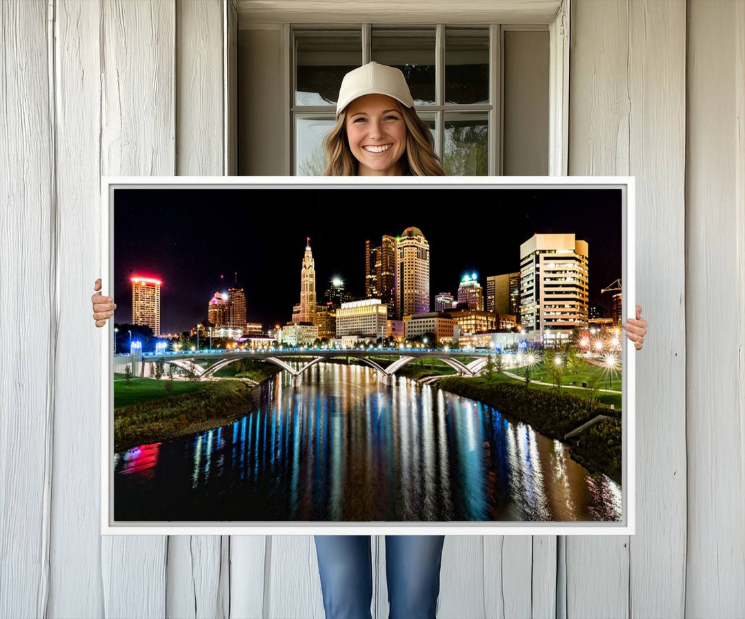 The Columbus City Lights Night Skyline Wall Art Canvas Print adorns the wall.