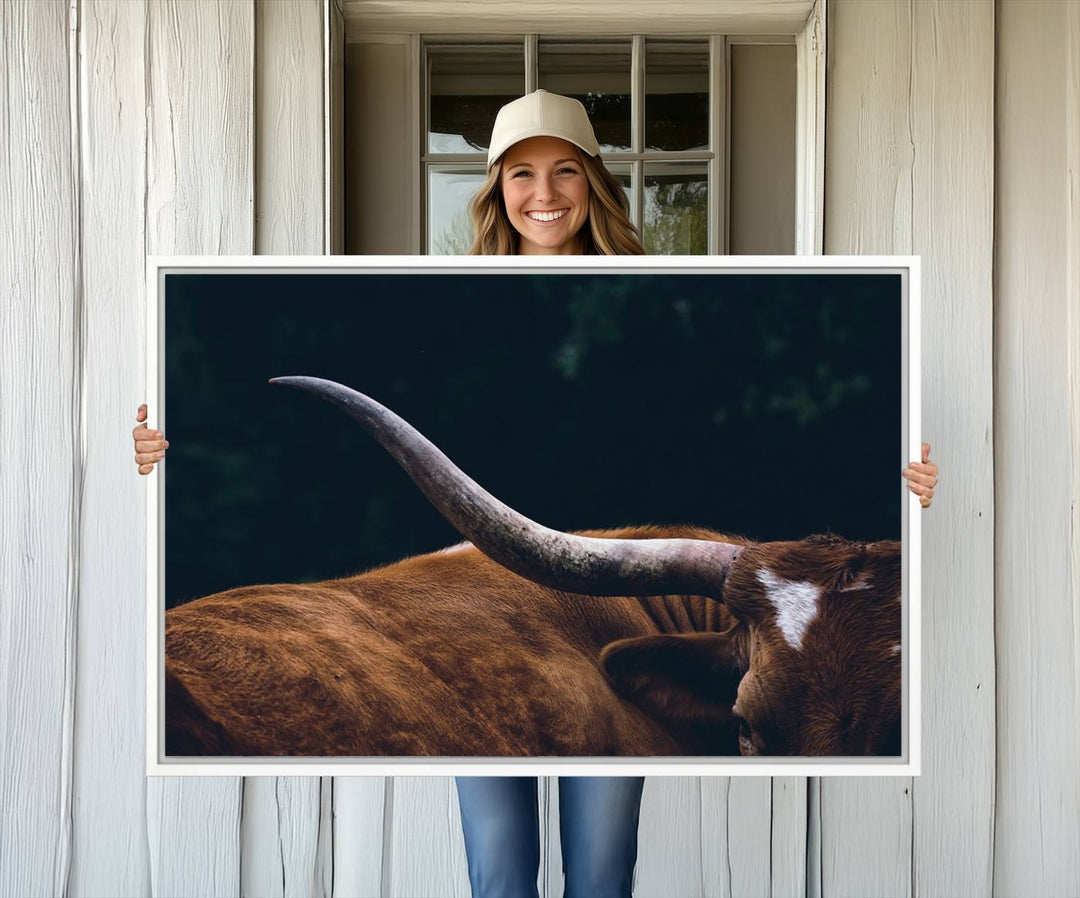 The kitchen dining area features a Texas Longhorn Bull wall art.