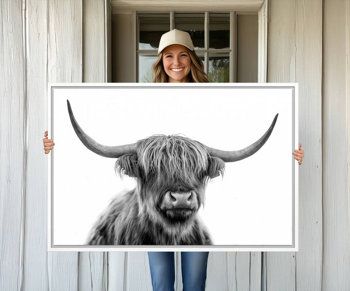 A Scottish Highland Cow Art Canvas adds charm to the farmhouse decor.