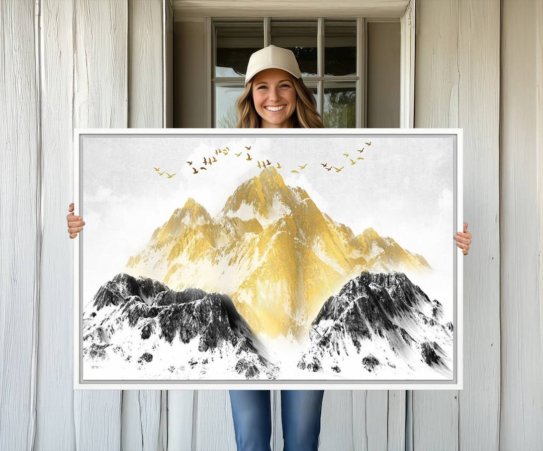 Golden Mountain Triptych Wall Art features gold-tinted mountains and birds.