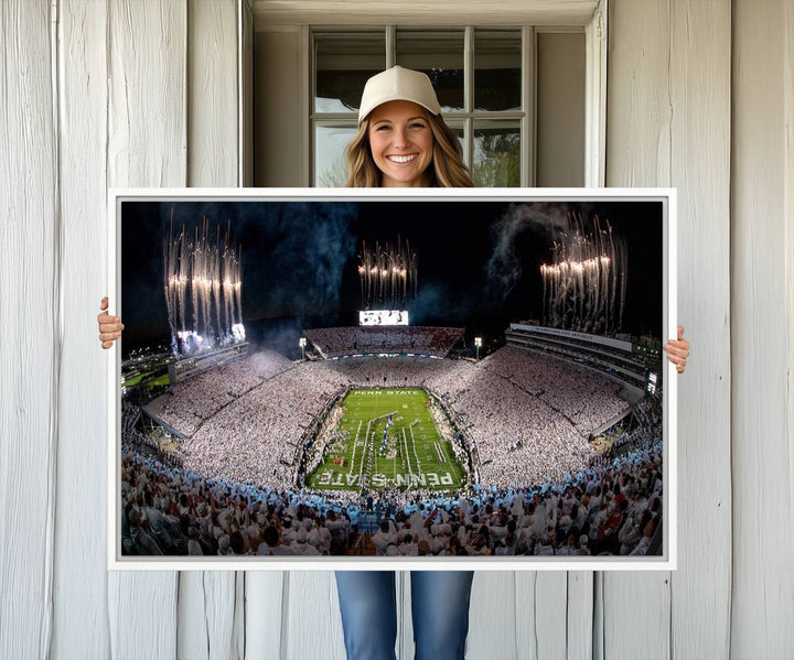 The perfect Penn State Football canvas wall art features a depiction of Beaver Stadium filled with fans in white, with fireworks exploding above.