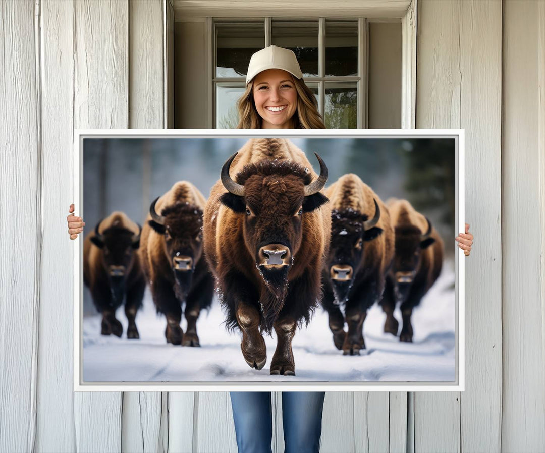 The dining room features an American Bison Herd Canvas Print against the snow.