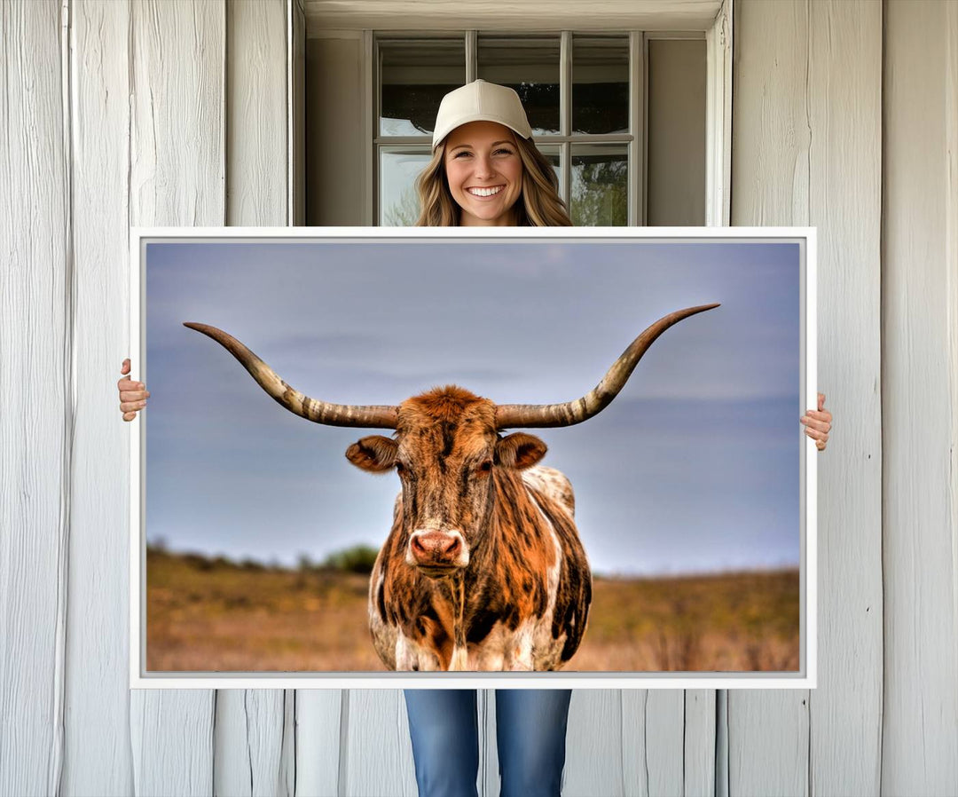 The Texas Longhorn Wall Art Print is displayed in a stylish living room.