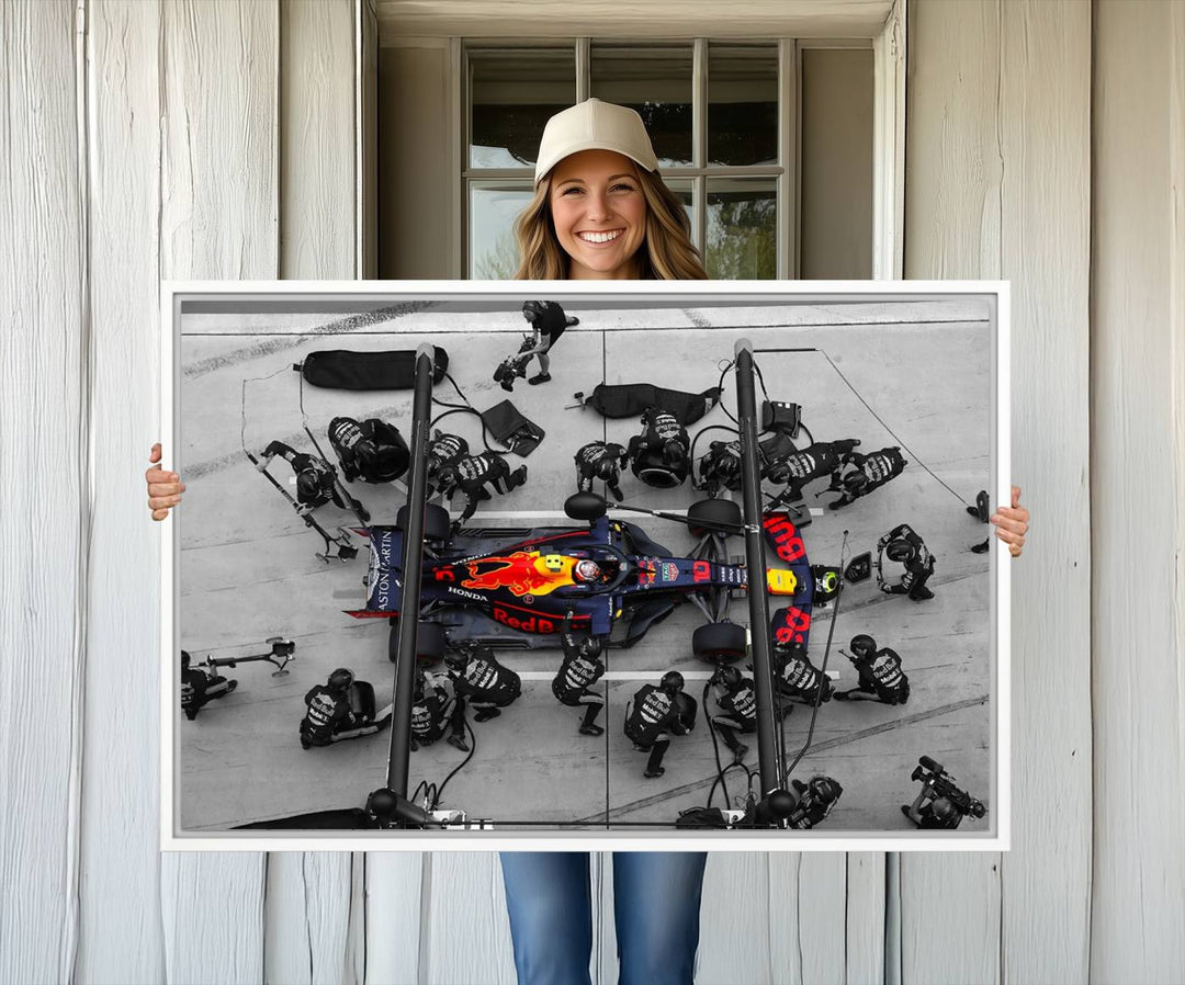 Red Bull Formula 1 Canvas Wall Art Print: An aerial view of a Formula 1 pit stop featuring a Red Bull car on premium canvas.