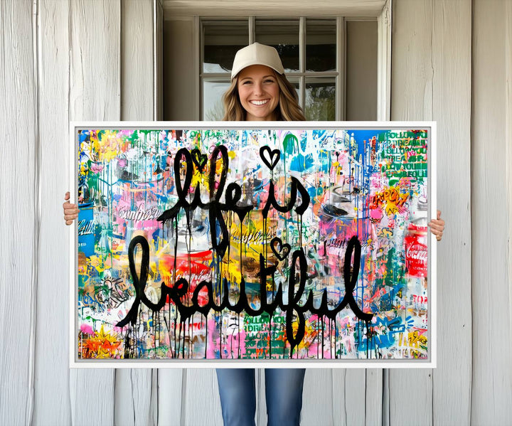 The Life Beautiful graffiti style canvas print is showcased in black script.