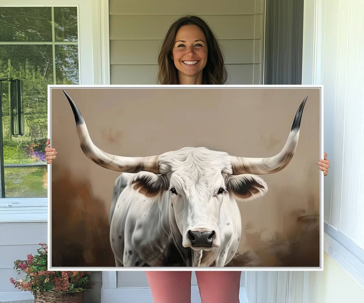 The kitchen features a striking canvas print of a Longhorn Bull.