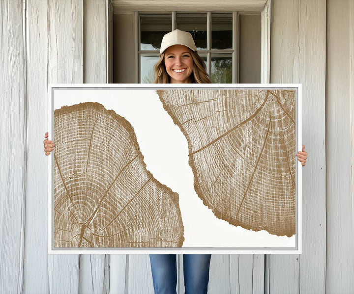 The rustic wall art features two large tree rings, beautifully framed and displayed to create a nature-inspired décor.