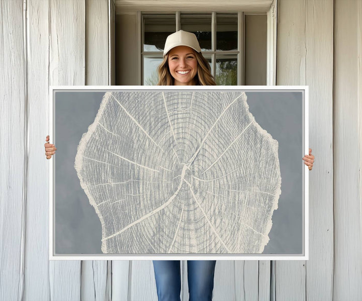 A gray wall displays the Abstract Tree Ring Wall Art print.