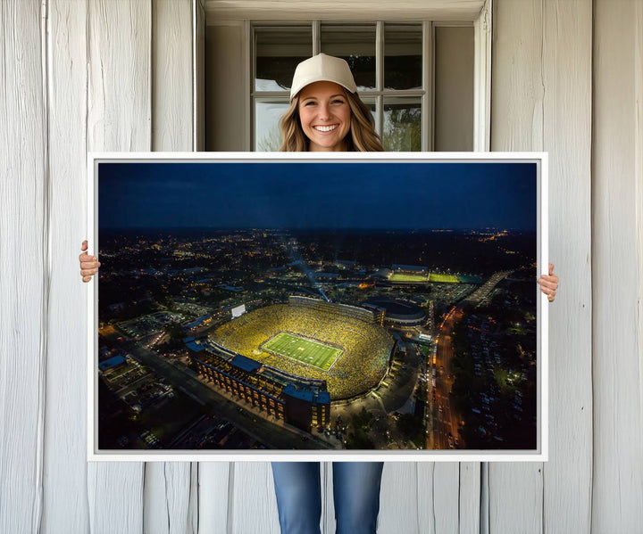 Aerial view of Michigan Stadium nightlife on canvas – Framed, ready-to-hang sports arena wall art.