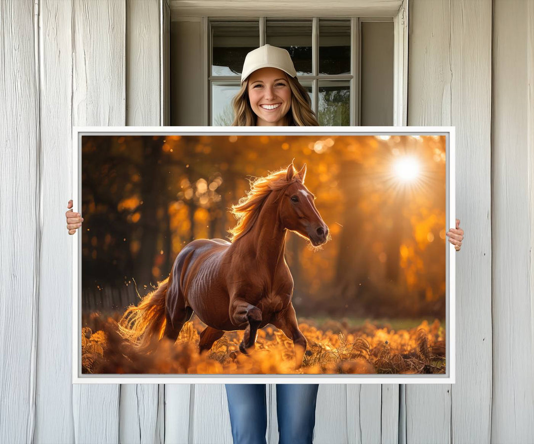 The Running Horse Sunset Forest Wall Art Canvas Print showcases a gallop in an autumn forest with sunlight streaming through the trees.