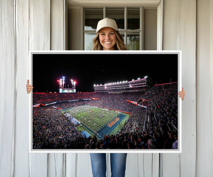 The Gators Night Game Canvas Art captures a lively night at Ben Hill Griffin Stadium with vibrant fireworks and the energy of a live band.