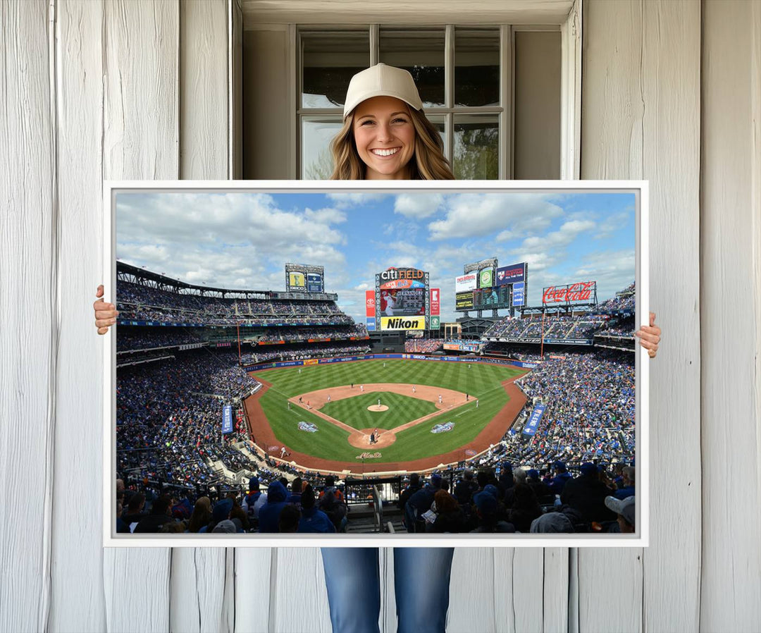 A wall art piece featuring a New York Mets Baseball Team print of Citi Field during a thrilling game under a blue sky.