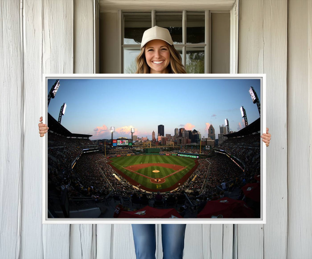 The PNC Park Evening Game Canvas, featuring a skyline backdrop, is displayed on the wall.