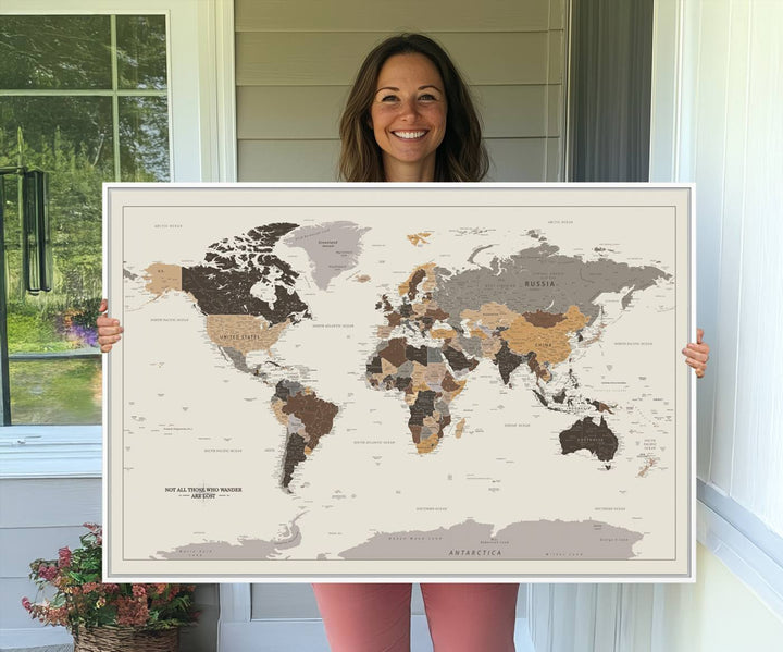 Antique-style world map canvas print with Not all those who wander are lost, perfect for vintage decor.