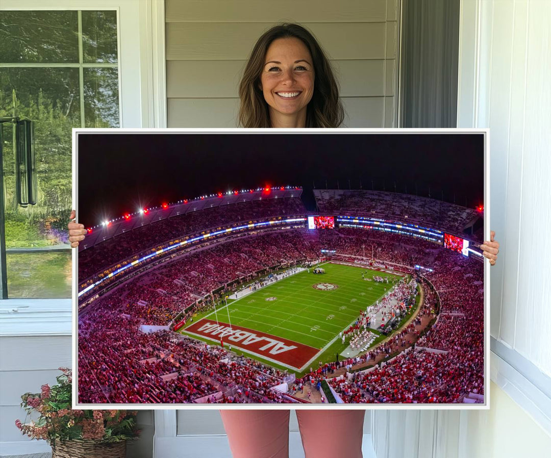 The living room features a Bryant-Denny Stadium Night Game Triple Canvas Wall Art.