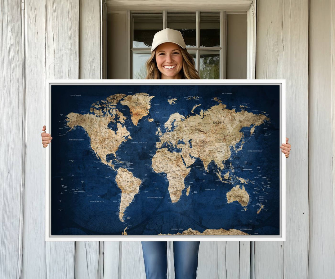 A personalized world map canvas print hangs above.