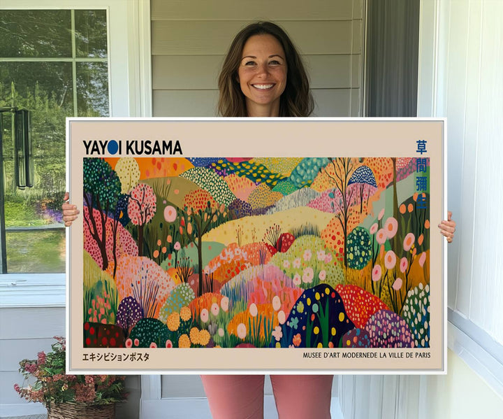 A Yayoi Kusama Wall Art Canvas Print featuring vibrant abstract floral patterns is displayed in a tranquil forest setting.