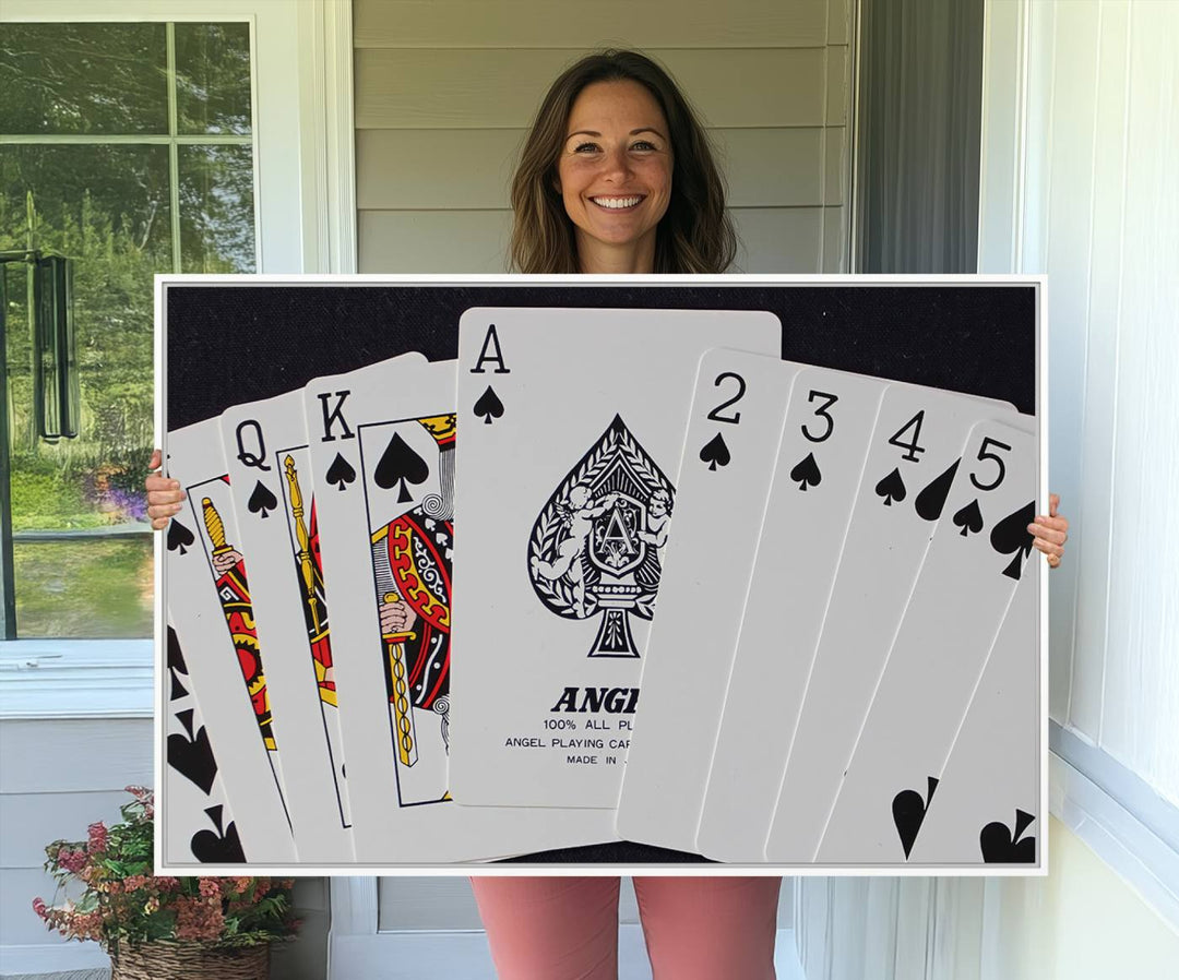 The oversized Poker Wall Art features the Ace of Spades and is displayed on a porch.