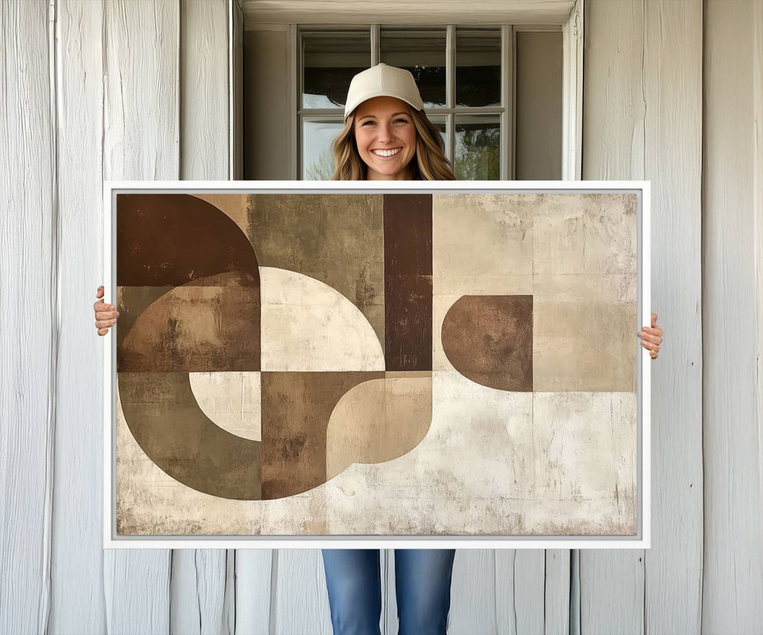 A Wabi Sabi Geometric Minimalist Wall Art Canvas Print—with a modern abstract geometric design in brown and beige tones—stands proudly in front of a house.