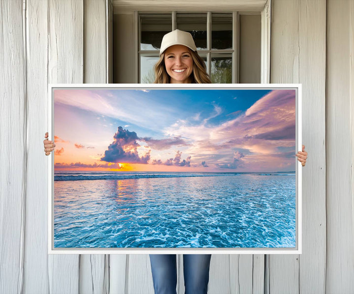 An Ocean Sunset Canvas Wall Art depicting a vibrant sky and rolling waves.