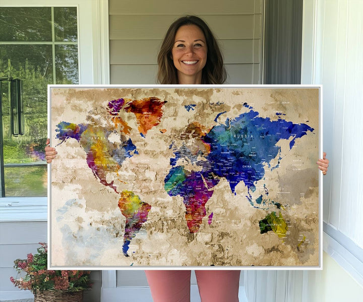 Watercolor World Map Canvas Print with gallery-wrapped edges.