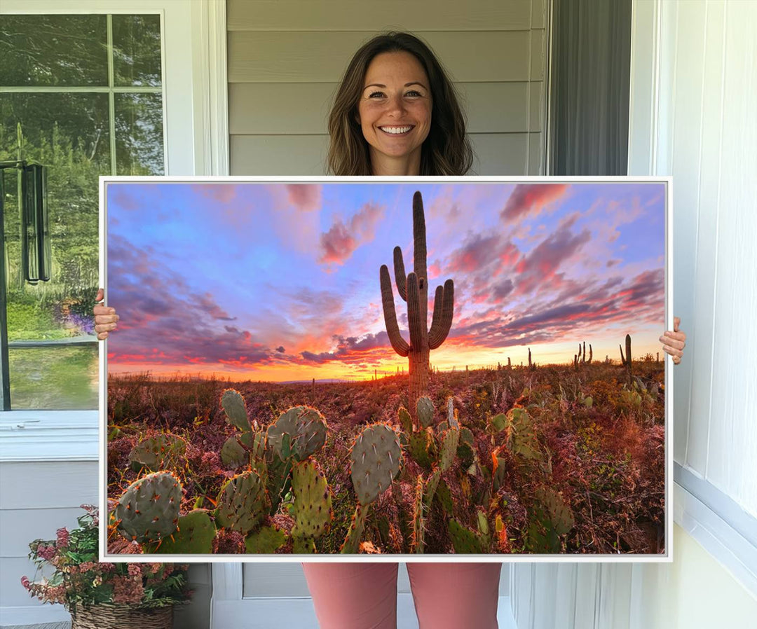 The Arizona Desert Sunset Wall Art Canvas Print featuring cacti is displayed.