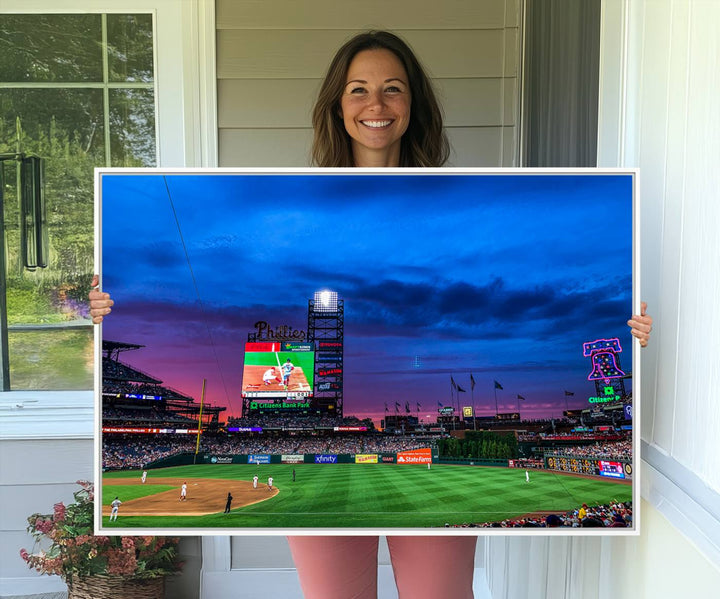 The Phillies canvas print captures a stunning sunset, vibrant signage, and players on the field.