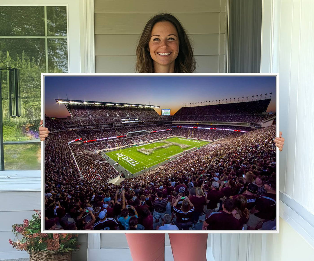 A vibrant canvas print of Texas A&M Aggies at College Stations Kyle Field Stadium captures the energy of fans cheering as the band marches at sunset.