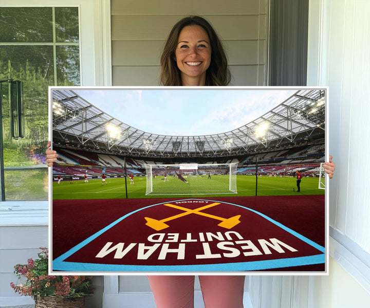 A soccer stadium with the West Ham United FC logo.