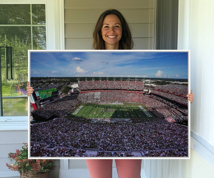 The wall art is a South Carolina Gamecocks print, showcasing Williams-Brice Stadium from a distance under clear skies.