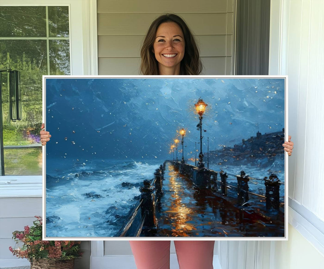 A framed oil painting depicts a stormy night at a beach pier, with glowing lamps and waves beneath a snow-filled sky.