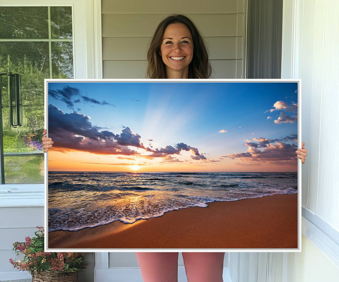 A Golden Hour Beach Sunset canvas hangs in the living room.