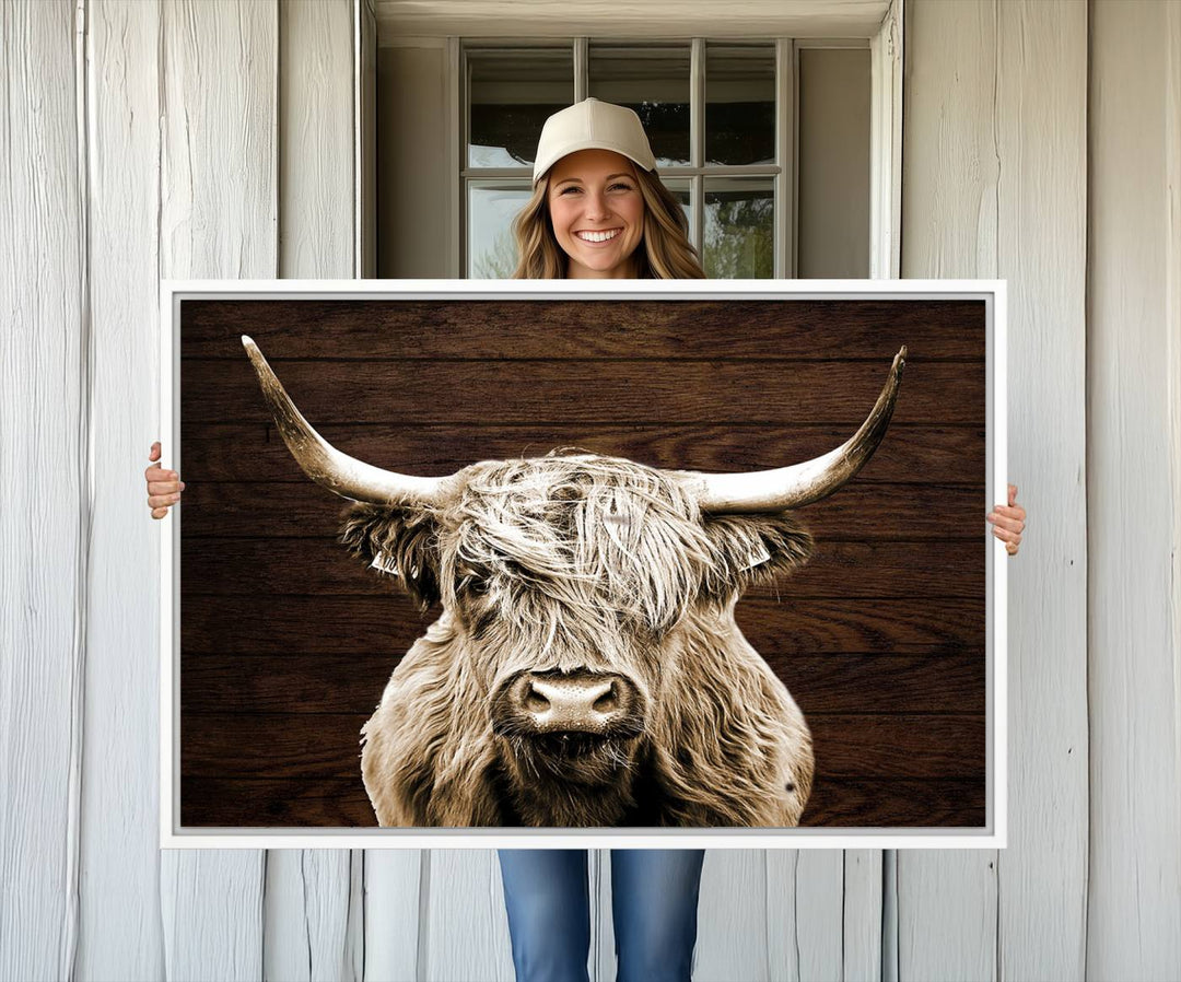 Highland Cow Wall Art Canvas Print: Majestic Scottish bull on rustic decor, ready to hang.