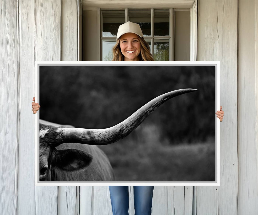 Cow Longhorn Wall Art: This black and white print adds rustic charm.