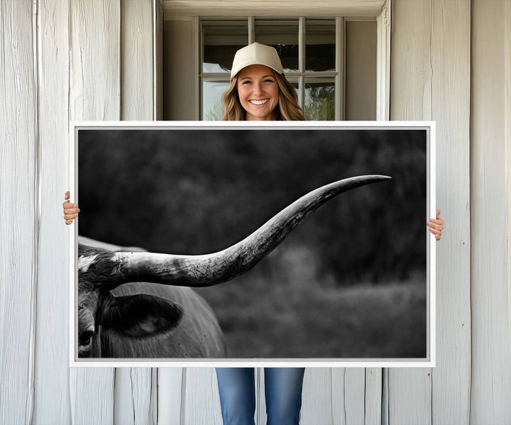 Cow Longhorn Wall Art: This black and white print adds rustic charm.