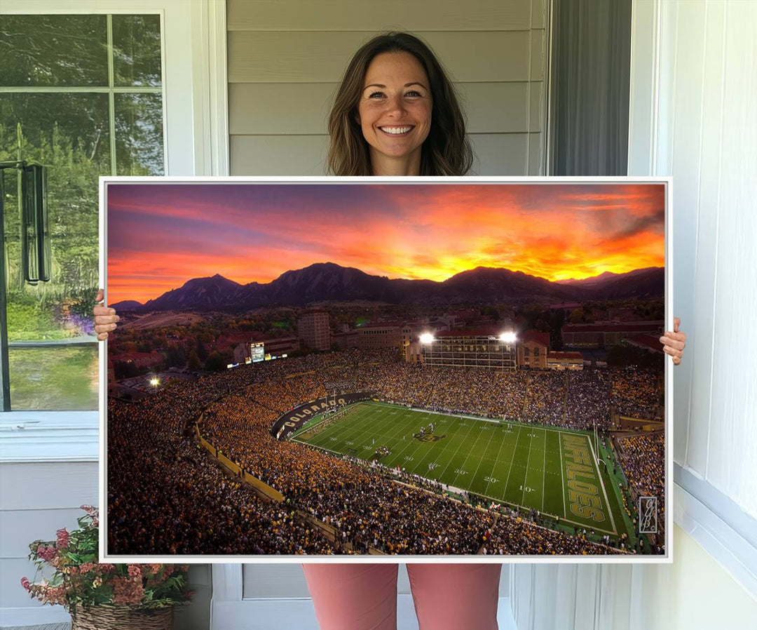 A vibrant mountain sunset at Folsom Field, home of the University of Colorado Football team, is captured in this stunning wall art canvas print.