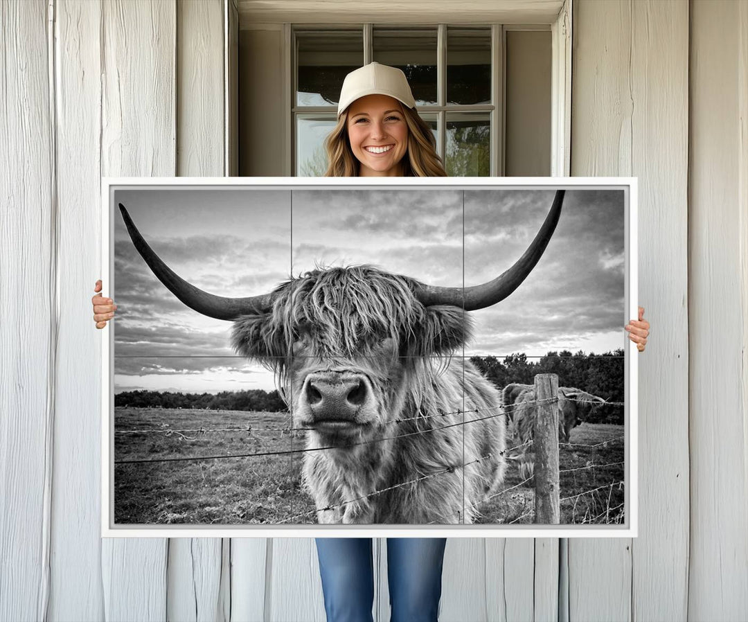 The Scottish Highland Cow Wall Art Canvas Print is ready to hang and framed, adding rustic farmhouse decor to your wall.