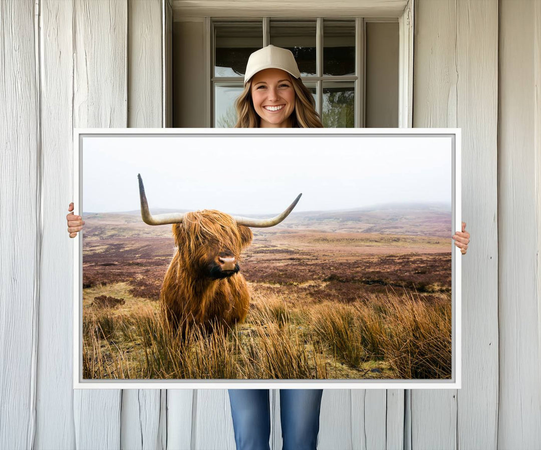 The Scottish Highland Cow Wall Art is perfect for rustic farmhouse decor, featuring misty moorland hues.