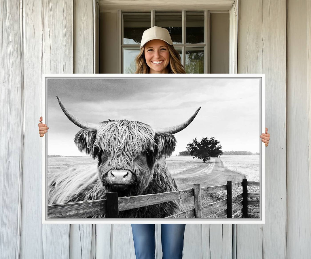 The Scottish Highland Cow Wall Art, a black and white canvas print, enhances rustic farmhouse décor.