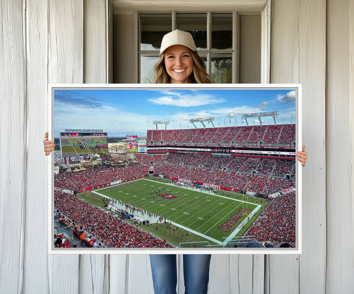 The Florida Tampa Raymond James Stadium Wall Art Canvas Print is featured above the cabinet.