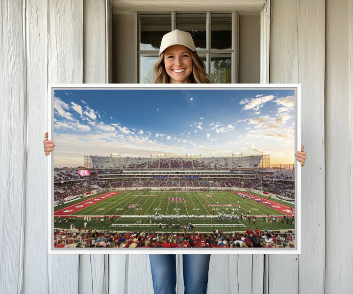 A Houston Cougars print of TDECU Stadium with a game crowd beautifully enhances the living room decor.