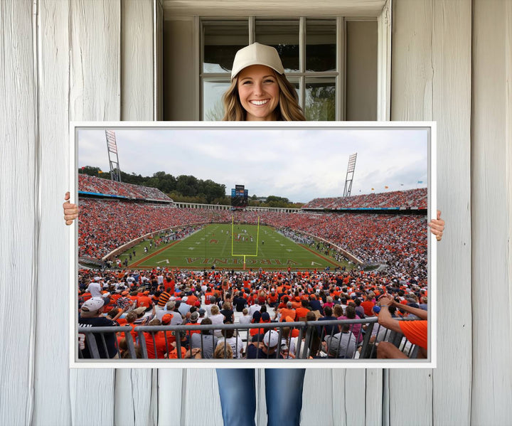 The Virginia Cavaliers Wall Art Canvas Print features a thrilling game at Scott Stadium surrounded by greenery.