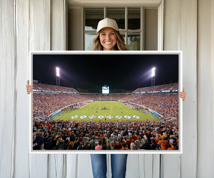 A Virginia Cavaliers Wall Art Canvas Print captures Scott Stadium filled with fans under the night sky.