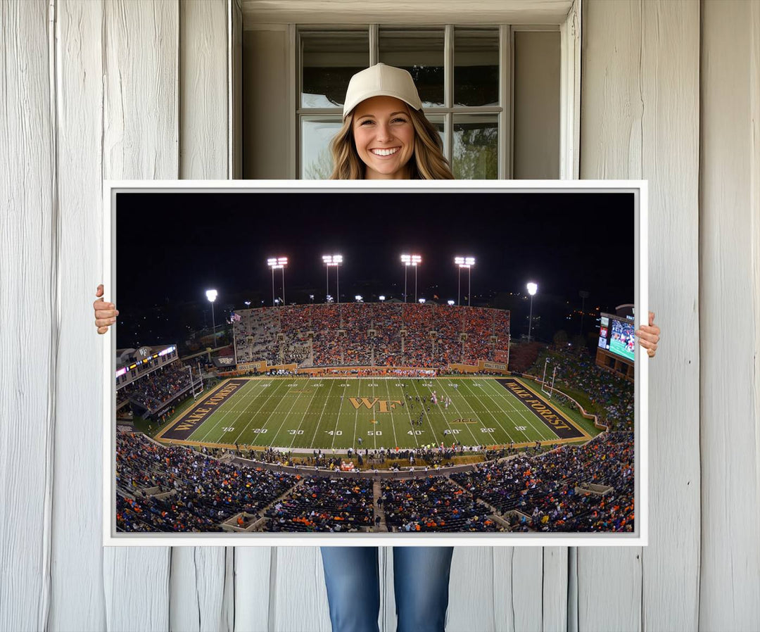 The Demon Deacons stadium print captures a brightly lit, bustling scene on museum-quality canvas.