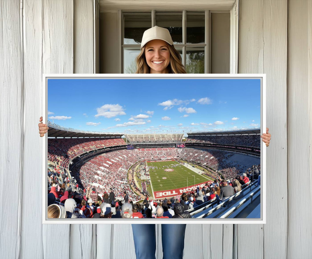 Canvas print of Alabama Crimson Tides Bryant-Denny Stadium, showcasing a sunlit field under a blue sky.