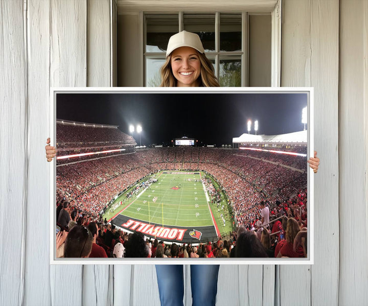 Panoramic view of a crowded football stadium with Louisville in the end zone, crafted as University of Louisville wall art.