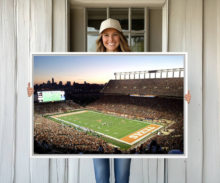 The Evening Game canvas art captures a glowing sunset and skyline at Texas Longhorns Darrell K Royal Stadium.